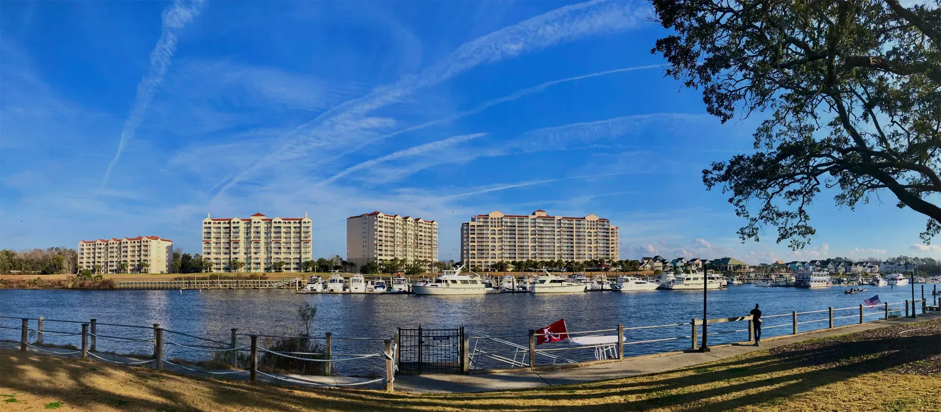 The North Myrtle Beach waterway with condo towers and boats along the marina
